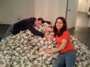 people on pile of money